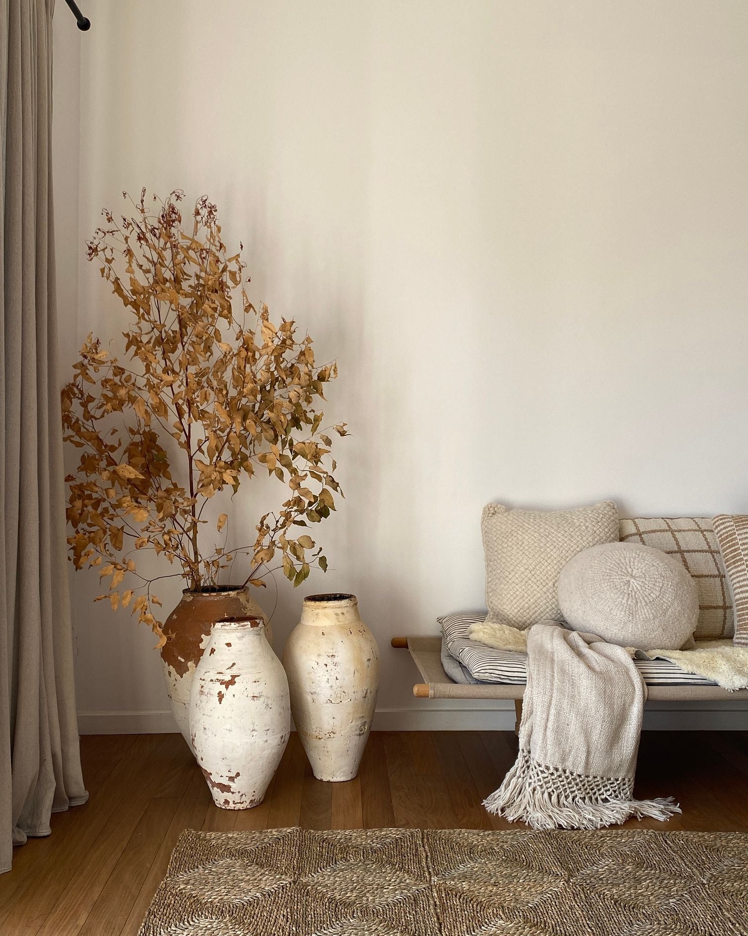 Styled Room with Rugs and Urns